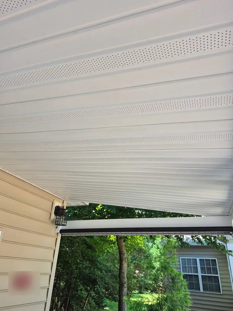 Finished vented vinyl porch ceiling